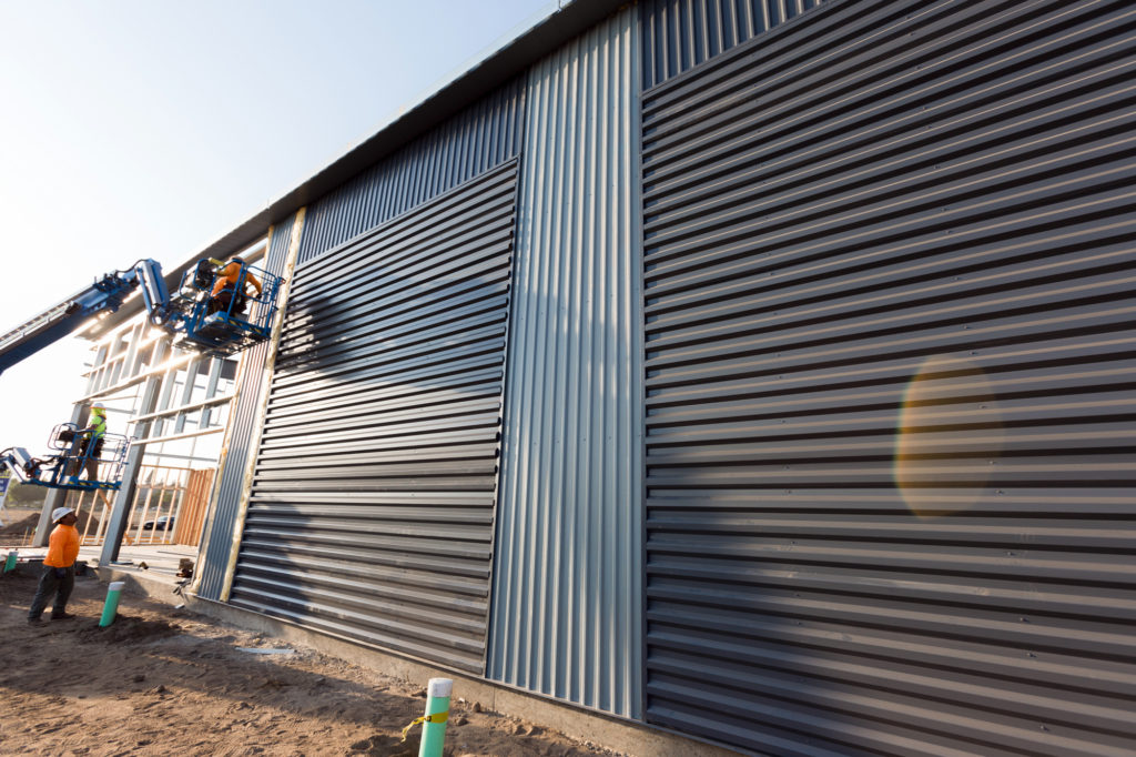 constructing the walls at alpine climbing adventure fitness