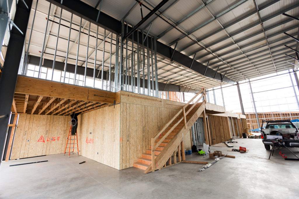 early construction of alpine climbing adventure fitness building during thanksgiving