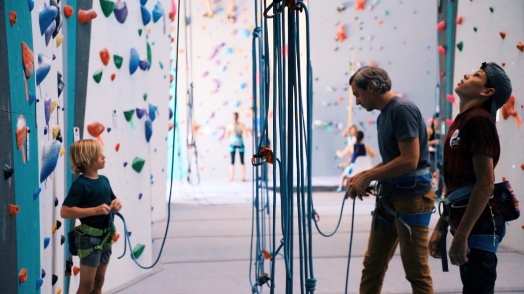 father and son climbing top rope in ripon california