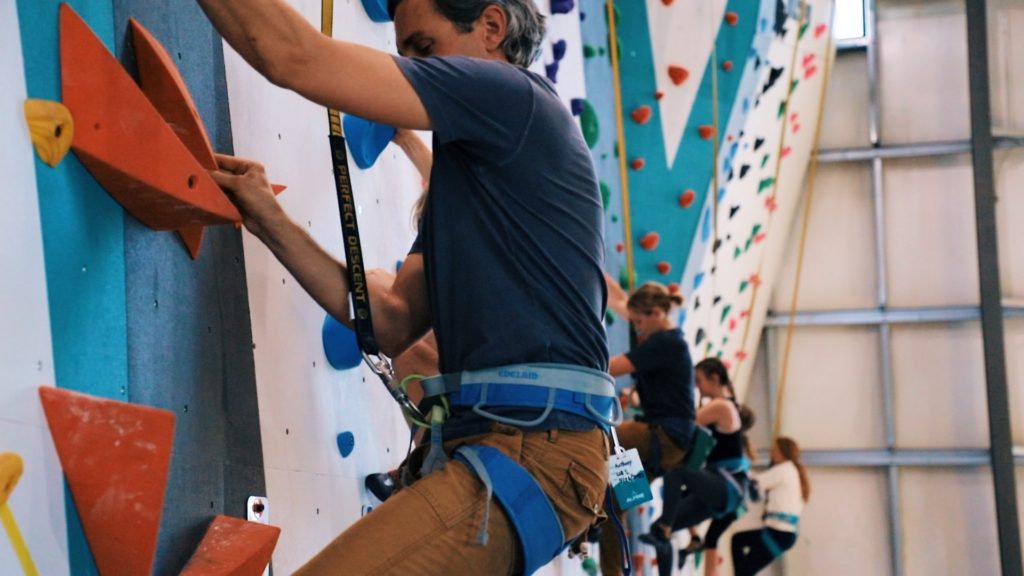 mast family - father leading the climb with the family